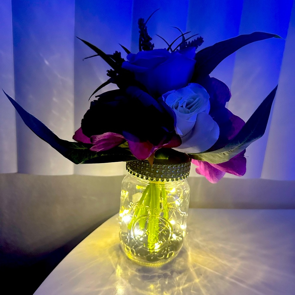 Handmade Faux flower in lighted mason jar.